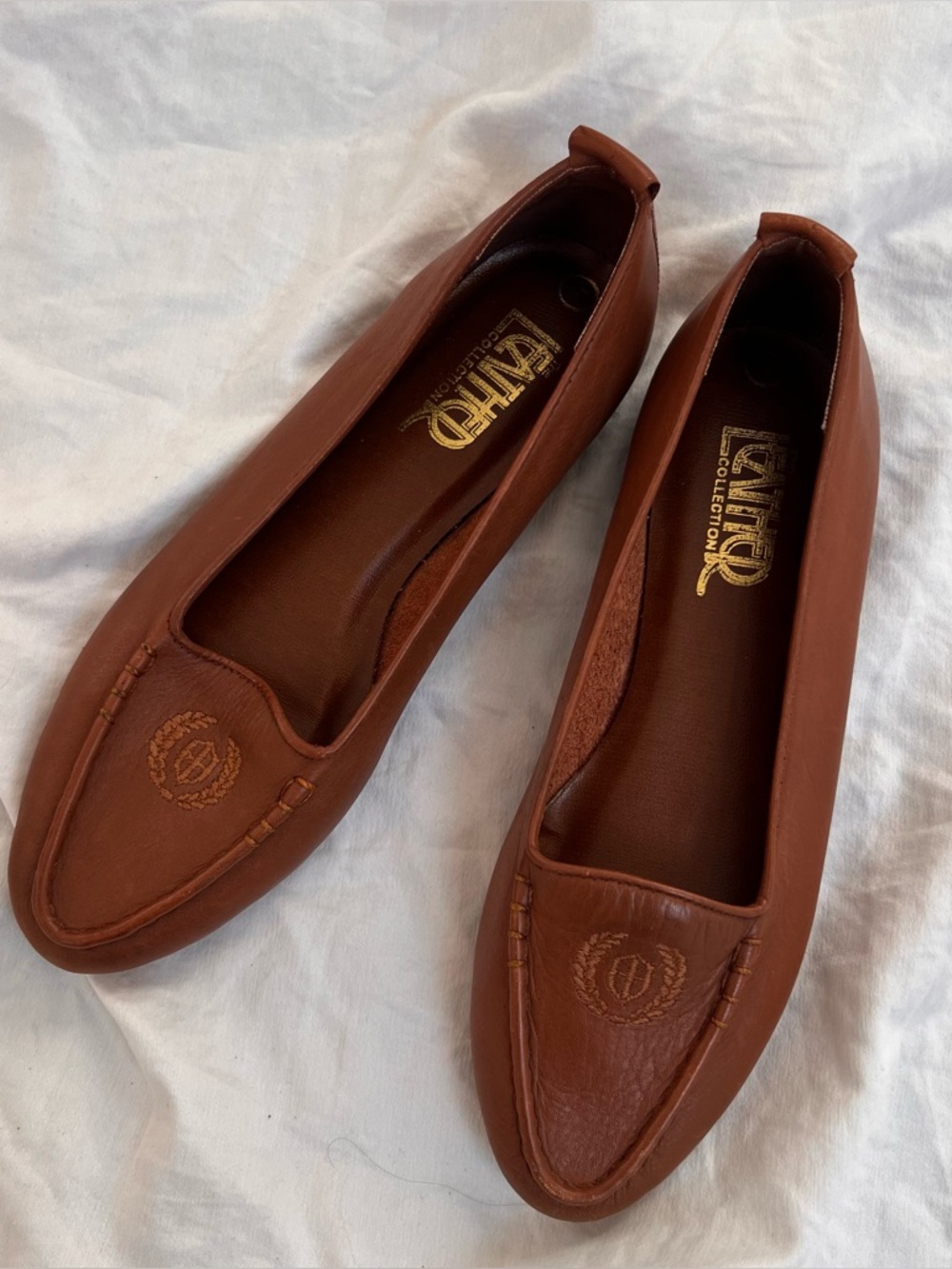 Brown genuine leather loafers with embossed logo // size 7